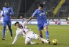 Empoli's Niccolo Cambiaghi, right, and Bologna's Alexis Saelemaekers battle for the ball during the Serie A soccer match between Empoli and Bologna at Castellani Stadium Empoli, Empoli, Italy, Friday March 15, 2024. (Marco Bucco/LaPresse via AP)