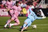 Inter Miami striker Luis Suárez scores past DC United goalkeeper Alexander Bono during the second half of an MLS soccer match at Audi Field, Saturday, March 16, 2024, in Washington. (AP Photo/Nathan Howard)