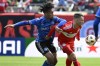 CF Montréal midfielder Nathan-Dylan Saliba, left, and Chicago Fire midfielder Fabian Herbers battle the ball during the second half of an MLS soccer match, Saturday, March 16, 2024, in Chicago. (AP Photo/Matt Marton)