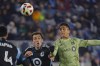 Minnesota United defender Devin Padelford, left, and Los Angeles FC forward Cristian Olivera vie for the ball during the first half of an MLS soccer match Saturday, March 16, 2024, in St. Paul, Minn. (AP Photo/Bruce Kluckhohn)