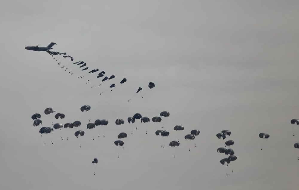 Humanitarian aid is airdropped to Palestinians in Gaza City, Gaza Strip, on Sunday, March 17, 2024. (AP Photo/Mohammed Hajjar)