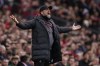 Liverpool's manager Jurgen Klopp yells during the FA Cup quarterfinal soccer match between Manchester United and Liverpool at the Old Trafford stadium in Manchester, England, Sunday, March 17, 2024. (AP Photo/Dave Thompson)