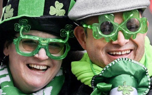 Members of the crowd look on as they enjoy the St. Patrick’s Day parade in Montreal, Sunday, March 17, 2024. THE CANADIAN PRESS/Graham Hughes