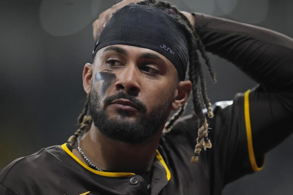 San Diego Padres' center fielder Fernando Tatis Jr. walks back to dugout during the exhibition game between the Team Korea and San Diego Padres at the Gocheok Sky Dome in Seoul, South Korea, Sunday, March 17, 2024. The Los Angeles Dodgers and the San Diego Padres will meet in a two-game series on March 20th-21st in Seoul for the MLB World Tour Seoul Series. (AP Photo/Lee Jin-man)