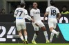 Napoli's Juan Jesus, center, celebrates after scoring his side's first goal during the Serie A soccer match between Inter Milan and Napoli at the San Siro Stadium, in Milan, Italy, Sunday, March 17, 2024. (AP Photo/Antonio Calanni)