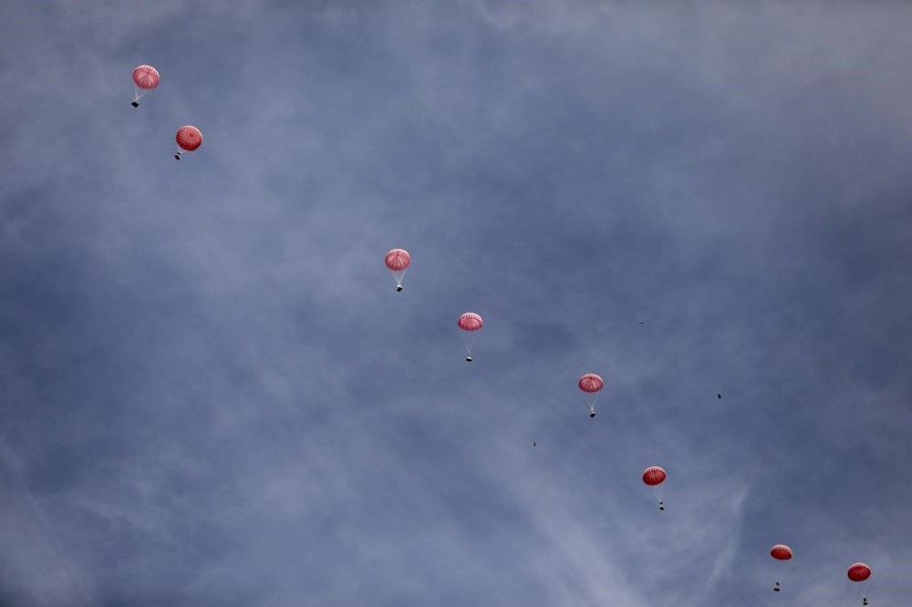 Humanitarian aid is airdropped to Palestinians in Gaza City, Gaza Strip, on Sunday, March 17, 2024. (AP Photo/Mohammed Hajjar)
