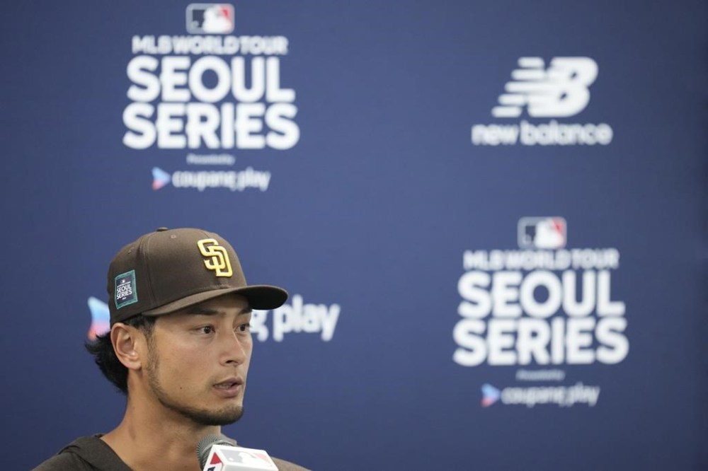 San Diego Padres' pitcher Yu Darvish answers a reporter's question during a press conference at the Gocheok Sky Dome in Seoul, South Korea, Monday, March 18, 2024. (AP Photo/Lee Jin-man)