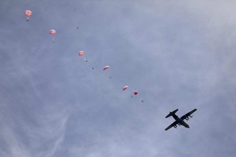 Humanitarian aid is airdropped to Palestinians in Gaza City, Gaza Strip, on Sunday, March 17, 2024. (AP Photo/Mohammed Hajjar)