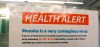Toronto Public Health says it is investigating the second lab-confirmed measles case in Toronto this year. A notice for a health alert about measles is posted on the door of a medical facility in Seattle on Wednesday, Feb. 13, 2019. THE CANADIAN PRESS/AP/Elaine Thompson