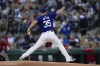 Los Angeles Dodgers starting pitcher Justin Wilson throws during the first inning of a spring training baseball game against the Cincinnati Reds on Friday, March 8, 2024, in Phoenix. The game was canceled because of rain. (AP Photo/Carolyn Kaster)
