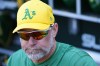 Oakland Athletics manager Mark Kotsay pauses in the dugout prior to the team's spring training baseball game against the Chicago Cubs on Thursday, March 14, 2024, in Mesa, Ariz. (AP Photo/Ross D. Franklin)
