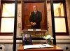 Members of the public who wish to pay tribute to Brian Mulroney can visit his casket in Ottawa starting this afternoon. A photograph and book of condolences for Members of Parliament to sign are seen in front of the official portrait of former prime minister Brian Mulroney, in the antechamber to the House of Commons on Parliament Hill, Ottawa, Friday, March 1, 2024. THE CANADIAN PRESS/Justin Tang