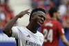 Real Madrid's Vinicius Junior celebrates after scoring his side's fourth goal during the Spanish La Liga soccer match between Osasuna and Real Madrid at the El Sadar stadium in Pamplona, Spain, Saturday, March 16, 2023. (AP Photo/Alvaro Barrientos)