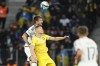 FILE - Ukraine's Artem Dovbyk jumps for a header with Italy's Francesco Acerbi, rear, during the Euro 2024 group C qualifying soccer match between Ukraine and Italy at the BayArena in Leverkusen, Germany, Monday, Nov. 20, 2023. Qualifying playoffs for the European Championship in men's soccer start Thursday, March 21, 2024 with strong plotlines among 12 teams playing for three tickets to the tournament in Germany. Israel and Ukraine play “home” games on neutral ground while their countries are involved in wars. They could even meet in a playoff final next week. (AP Photo/Martin Meissner, File)