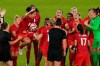 Canada players including Christine Sinclair (holding ball) celebrate their win against Sweden during the women's soccer gold medal game at the Tokyo Olympics in Yokohama, Japan on Friday, August 6, 2021. Canada could find itself facing two top-10 teams in pool play when it opens defence of its Olympic women's soccer title this summer in Paris. THE CANADIAN PRESS/Adrian Wyld