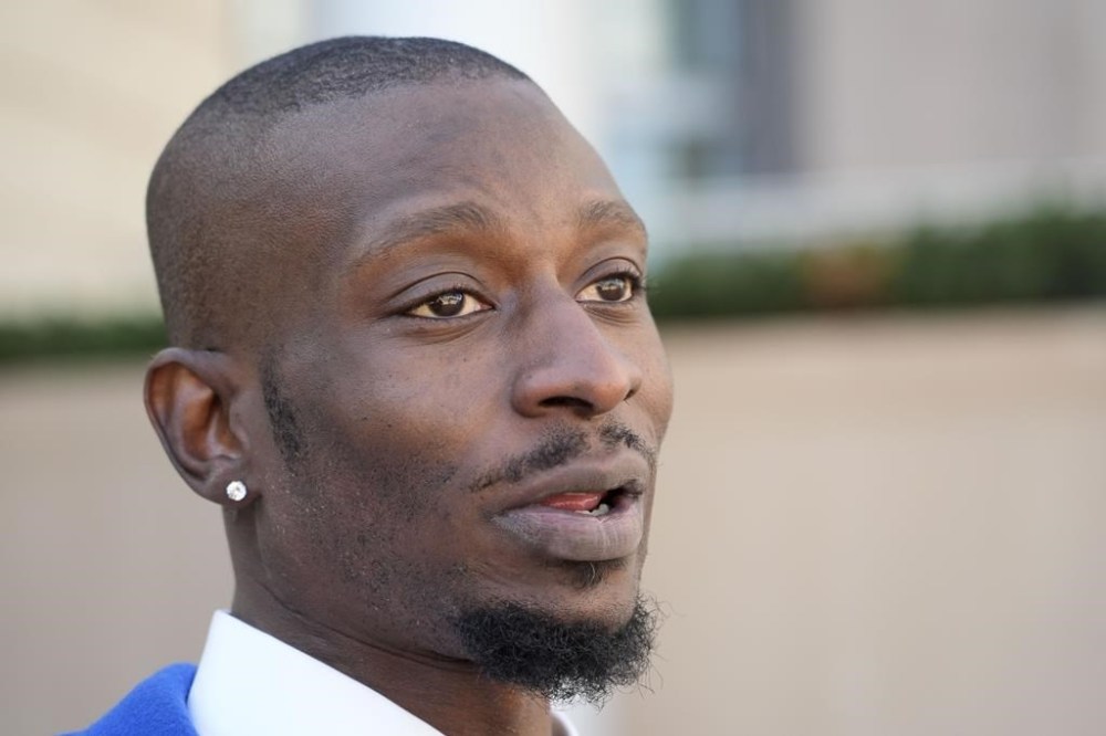 Michael Corey Jenkins speaks outside the federal courthouse in Jackson, Miss., Tuesday, March 19, 2024. A former Mississippi sheriff’s deputy was sentenced to about 20 years in prison for his part in torturing Jenkins and Eddie Terrell Parker in a racist assault last year and for his role in a separate episode where a white man was sexually assaulted. (AP Photo/Rogelio V. Solis)