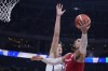 Canada forward Dillon Brooks (24) shoots against U.S. centre Walker Kessler (14) during the Basketball World Cup bronze medal game between the United States and Canada in Manila, Philippines, Sunday, Sept. 10, 2023. THE CANADIAN PRESS/AP/Michael Conroy