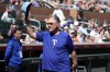 Texas Rangers manager Bruce Bochy waves to the crowd as he is introduced prior to a spring training baseball game against the San Francisco Giants, Friday, March 1, 2024, in Scottsdale, Ariz. (AP Photo/Ross D. Franklin)