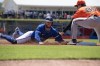Toronto Blue Jays rightfielder George Springer is thrown out trying to steal third base during spring training action against the Baltimore Orioles Tuesday, March 19, 2024, in Dunedin, Florida. THE CANADIAN PRESS/Mark Taylor