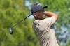Xander Schauffele follows the flight of his tee shot on the fourth hole during the final round of The Players Championship golf tournament Sunday, March 17, 2024, in Ponte Vedra Beach, Fla. (AP Photo/Lynne Sladky)