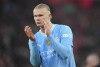 Manchester City's Erling Haaland applauds after the English Premier League soccer match between Liverpool and Manchester City, at Anfield stadium in Liverpool, England, Sunday, March 10, 2024. The match ended 1-1. (AP Photo/Jon Super)