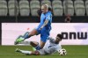 Iceland's Arnor Sigurdsson, left, is tackled by Israel's Roy Revivo during the Euro 2024 qualifying play-off soccer match between Israel and Iceland, at Szusza Ferenc Stadium in Budapest, Hungary, Thursday, March 21, 2024. (AP Photo/Darko Vojinovic)