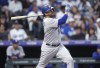 FILE - Los Angeles Dodgers' J.D. Martinez watches his two-run home run off Colorado Rockies starting pitcher Chris Flexen during the first inning of a baseball game Sept. 28, 2023, in Denver. Martinez has a new home, agreeing to a $12 million, one-year contract with the New York Mets on Thursday, March 21, according to a person familiar with the deal. The person spoke to The Associated Press on condition of anonymity because the agreement was pending a physical. (AP Photo/David Zalubowski, File)
