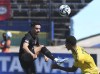 Canada's Stephen Eustaquio, left, fights for the ball with Jamaica's Ethan Pinnock during the Concacaf Nations League quarterfinal match at the National stadium in Kingston, Jamaica, Saturday, Nov. 18, 2023. Eustaquio will captain Canada in Saturday's Copa America qualifier against Trinidad and Tobago. THE CANADIAN PRESS/AP-Collin Reid