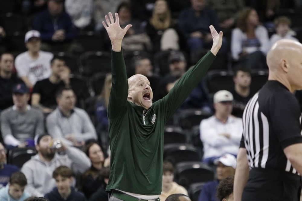 UAB head coach Andy Kennedy signals his team during the first half of a first-round college basketball game in the NCAA Tournament against San Diego State in Spokane, Wash., Friday, March 22, 2024. (AP Photo/Young Kwak)