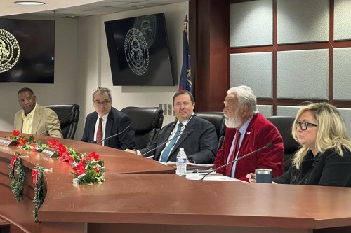 FILE - The five Republican members of the Georgia Public Service Commission discuss a rate increase for Georgia Power Co. to pay costs at the utility's Vogtle nuclear power plant, Dec. 19, 2023, in Atlanta. A bill passed Thursday, March 21, 2024, by Georgia lawmakers would add an extra two years to the terms of commissioners in response to a court case. (AP Photo/Jeff Amy, File)
