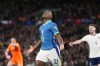Brazil's Endrick celebrates after scoring the opening goal during a friendly soccer match between England and Brazil at Wembley Stadium in London, Saturday, March 23, 2024. (AP Photo/Alastair Grant)