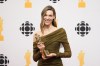 Charlotte Cardin poses with the Juno Award for Pop Album of the Year during the Juno Awards in Halifax on Saturday, March 23, 2024. THE CANADIAN PRESS/Darren Calabrese