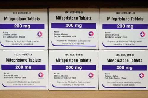 FILE - Boxes of the drug mifepristone sit on a shelf at the West Alabama Women's Center in Tuscaloosa, Ala., on March 16, 2022. On Tuesday, March 26, 2024, the U.S. Supreme Court will take up a case that could impact how women get access to mifepristone, one of the two pills used in the most common type of abortion in the nation. (AP Photo/Allen G. Breed, File)