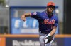 New York Mets pitcher Austin Adams throws live batting practice during a spring training baseball workout, Feb. 17, 2024, in Port St. Lucie, Fla. Adams was acquired by the Oakland Athletics from the New York Mets on Sunday, March 24. (AP Photo/Jeff Roberson)