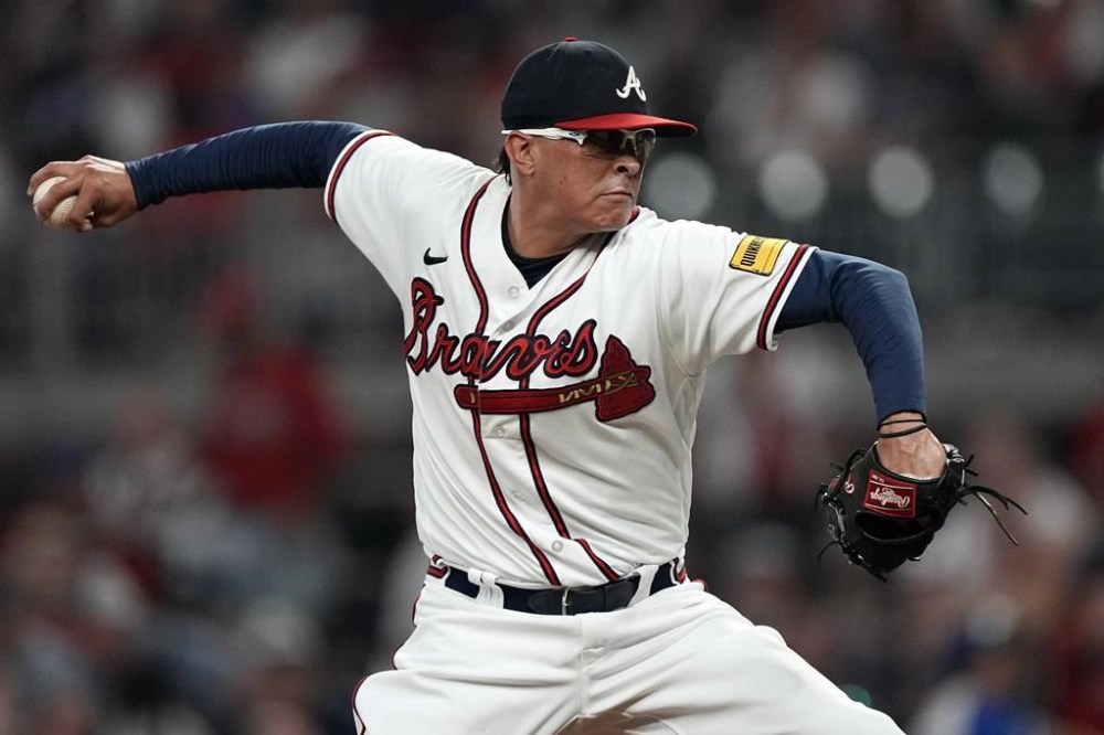 FILE - Atlanta Braves relief pitcher Jesse Chavez works against the New York Mets during the eighth inning of a baseball game Tuesday, June 6, 2023, in Atlanta. The Braves signed veteran right-hander Jesse Chavez to a minor league contract on Monday, March 25, 2024, providing the opportunity for the reliever's fifth stint with the team. Chavez, 40, was released by the Chicago White Sox on Saturday. (AP Photo/John Bazemore, File)