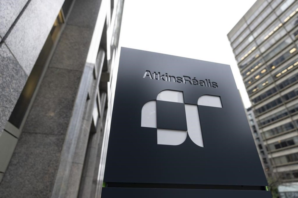 AtkinsRéalis headquarters are seen in Montreal, Friday, Nov. 10, 2023. AtkinsRéalis, formerly known as SNC-Lavalin, says it has been awarded the engineering contract for the Projet Mauricie green hydrogen hub in Quebec. THE CANADIAN PRESS/Christinne Muschi
