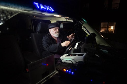 Harold Butler plays the spoons in his Bugden's cab in St. John's, Newfoundland, on Thursday, March 21, 2024. The cabbie has auditioned for Canada's Got Talent. THE CANADIAN PRESS/Paul Daly