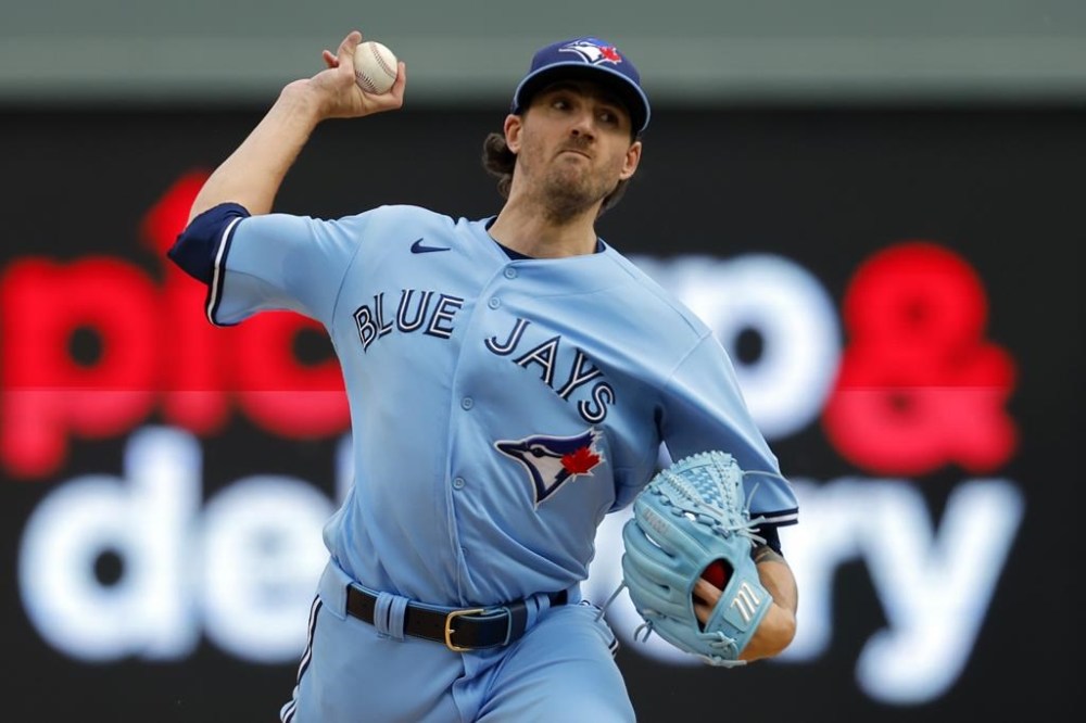 Toronto Blue Jays starting pitcher Kevin Gausman throws to a Minnesota Twins batter during the first inning in Game 1 of an AL wild-card baseball playoff series Tuesday, Oct. 3, 2023, in Minneapolis. Jake Lamb's go-ahead two-run RBI single in the fifth inning helped the Pittsburgh Pirates earn a 4-3 win over the Toronto Blue Jays, spoiling Kevin Gausman's spring training debut on Monday. THE CANADIAN PRESS/AP-Bruce Kluckhohn