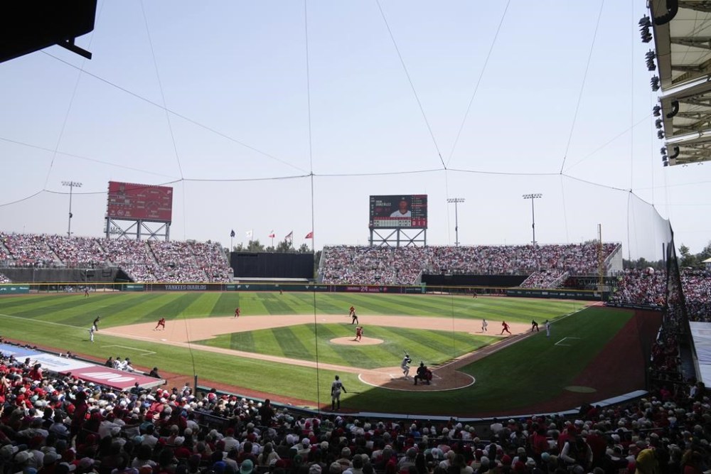 Diablos Rojos' pitcher Trevor Bauer throws against New York Yankees' Oscar Gonzalez during the third inning of an exhibition baseball game at Alfredo Harp Helu Stadium in Mexico City, Sunday, March 24, 2024. (AP Photo/Fernando Llano)