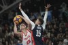 FILE - Chile's Kevin Rubio, left, and the United States' Dylan Travis play in men's 3x3 basketball gold medal match of the Pan American Games in Santiago, Chile, Monday, Oct. 23, 2023. USA Basketball announced its men’s 3x3 roster for the Paris Games on Tuesday, March 26, 2024, going with the same foursome that won a silver medal at the World Cup and gold at the Pan American Games last year.(AP Photo/Dolores Ochoa, File)