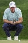 Tom Hoge lines upo his putt on the first green during the third round of The Players Championship golf tournament Saturday, March 16, 2024, in Ponte Vedra Beach, Fla. (AP Photo/Marta Lavandier)