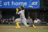 FILE - Oakland Athletics' Tony Kemp follows through on a swing during a baseball game against the Texas Rangers, Saturday, Sept. 9, 2023, in Arlington, Texas. Kemp agreed to a $1 million, one-year contract with the Baltimore Orioles on Tuesday, March 26, 2024, one week after the 32-year-old was released from a minor league deal with the Cincinnati Reds.(AP Photo/Tony Gutierrez, File)