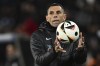 Greece's head coach Gustavo Poyet catches the ball during the Euro 2024 qualifying play-off soccer match between Georgia and Greece at the Boris Paichadze National Stadium in Tbilisi, Georgia, Tuesday, March 26, 2024. (AP Photo/Tamuna Kulumbegashvili)