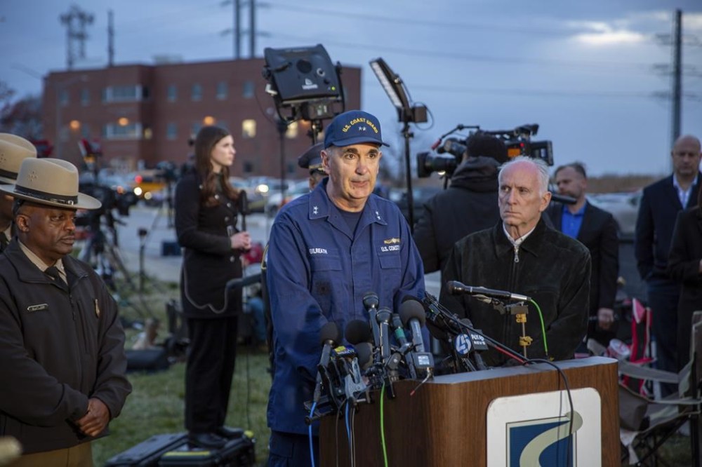 Rear Adm. Shannon Gilreath, commander of the Fifth Coast Guard District, speaks in Dundalk, Md., on Tuesday, March 26, 2024, as officials announce that all six workers missing after a Baltimore bridge collapsed are presumed dead and the search for them has been suspended until Wednesday morning. Officials said that the search and rescue mission was transitioning to one of search and recovery. (AP Photo/Ted Shaffrey)