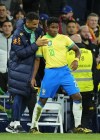 Brazil's Endrick, right, reacts after scoring his side's second goal during a friendly soccer match between Spain and Brazil at the Santiago Bernabeu stadium in Madrid, Spain, Tuesday, March 26, 2024. (AP Photo/Jose Breton)