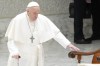 Pope Francis arrives in the Paul VI hall on the occasion of the weekly general audience at the Vatican, Wednesday, March 27, 2024. (AP Photo/Gregorio Borgia)