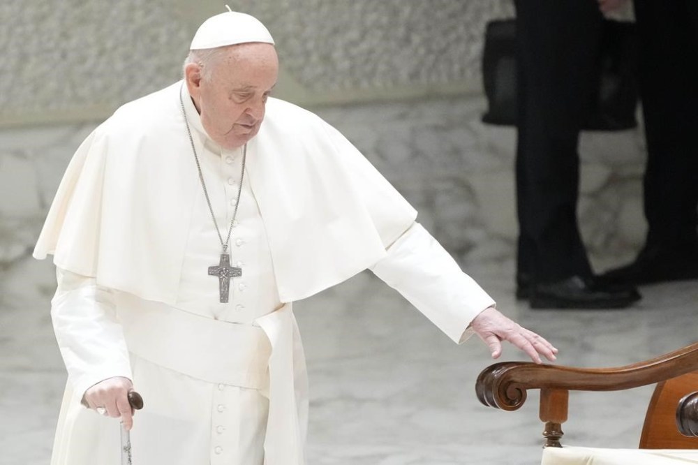 Pope Francis arrives in the Paul VI hall on the occasion of the weekly general audience at the Vatican, Wednesday, March 27, 2024. (AP Photo/Gregorio Borgia)