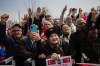 Supporters listen to Istanbul Mayor and Republican People's Party, or CHP, candidate for Istanbul Ekrem Imamoglu during a campaign rally, in Istanbul, Turkey, Tuesday, March 19, 2024. With local elections across Turkey days away, legal experts are coaching thousands of volunteer election monitors on the rules they'll need to watch for fraud and ensure a fair vote. (AP Photo/Francisco Seco)