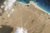 This satellite photo captured by Planet Labs PBC shows the construction of an airstrip on Abd al-Kuri Island, Yemen, Monday, March 25, 2024. As Yemen's Houthi rebels continue to target ships in a vital Mideast waterway, satellite pictures analyzed by The Associated Press show what appears to be a new airstrip being built at an entrance to that crucial maritime route. No country has claimed publicly the active construction taking place this month on Abd al-Kuri Island, a barren stretch of land rising out of the Indian Ocean near the mouth of the Gulf of Aden. However, satellite images shot for the AP appear to show workers have laid out 