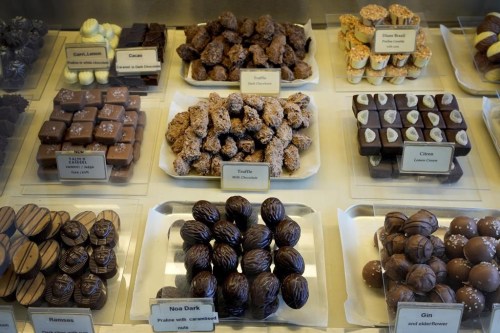 Luxury handmade Belgian Chocolates are seen displayed at Sandrine a chocolate shop owned by Niaz Mardan, in south west London, Thursday, March 21, 2024. Niaz Mardan, is suffering due to high cocoa prices, she's making no profits and fears she will have to close the shop that's been around for 25 years (she's the third owner and took over in 2019). (AP Photo/Kirsty Wigglesworth)